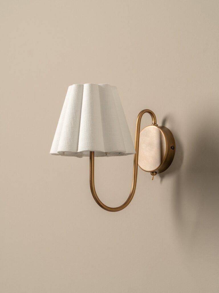 Pinhel Curled Arm Fluted Linen Shade Antiqued Brass Wall Sconce